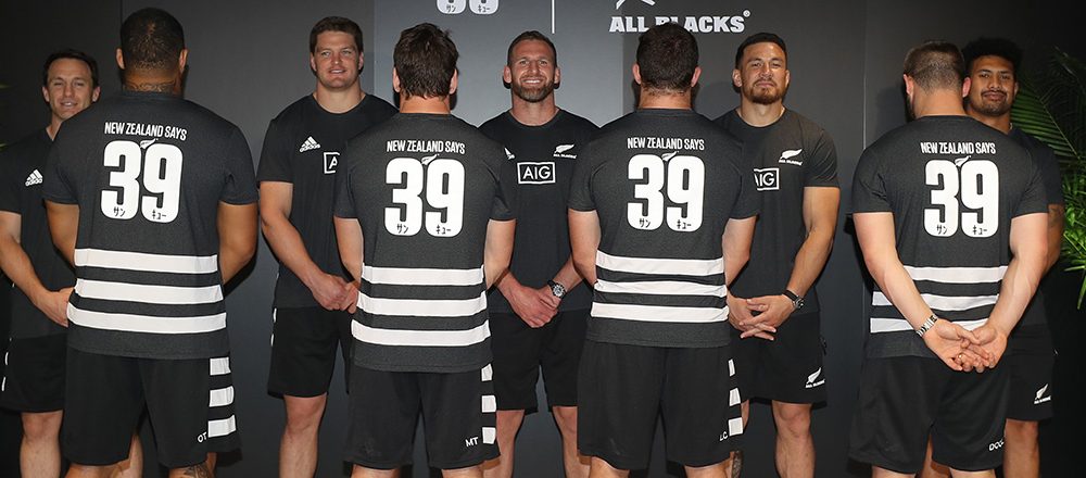 KASHIWANOHA, JAPAN - SEPTEMBER 12: (L-R) Ben Smith, Ofa Tuungafasi, Scott Barrett,  Matt Todd, Kieran Read, Liam Coltman, Sonny Bill Williams, Dane Coles and Ardie Savea of the All Blacks launch a gesture of gratitude to the Japanese people on September 12, 2019 in Kashiwanoha, Japan. In Japanese, ‘39’ means ‘San Kyu’ and on behalf of New Zealand we say ‘Thank You’ for hosting us.  (Photo by Hannah Peters/Getty Images for Tourism NZ)