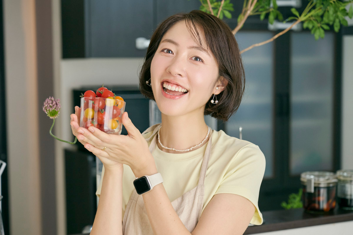 ミニトマトを持っている菅野ひろえ
さん